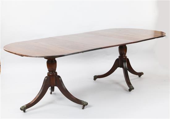 A Regency style mahogany extending dining table, Extends to 9ft 6in. x 3ft 6in. H.2ft 5in.